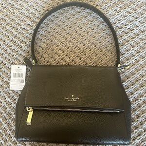 Black Kate Spade purse. Brand new with tag.
